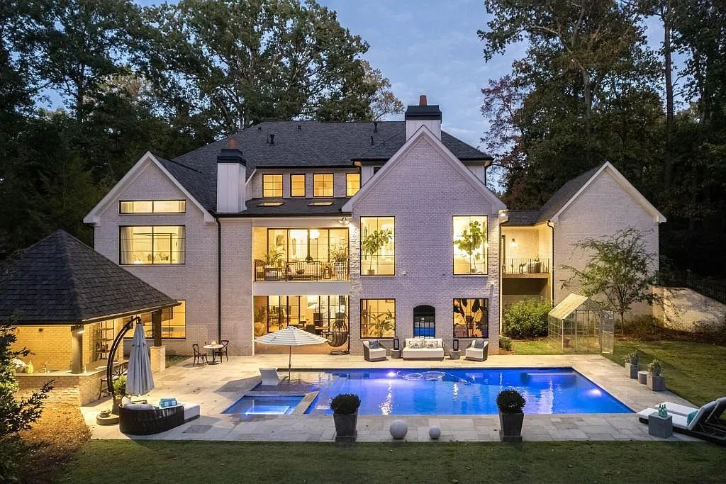 The Property in Atlanta boasts both a main & upper-level luxurious, primary suite, an elevator, hard to find 5 car, now available for sale. This home located at 4220 Harris Trl NW, Atlanta, Georgia