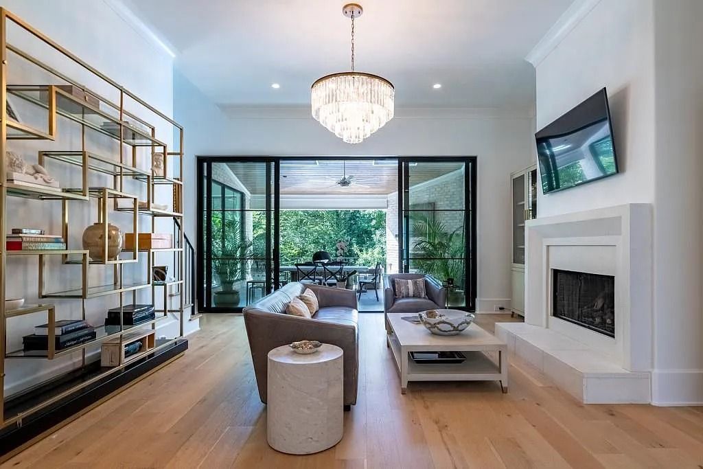 The Property in Atlanta boasts both a main & upper-level luxurious, primary suite, an elevator, hard to find 5 car, now available for sale. This home located at 4220 Harris Trl NW, Atlanta, Georgia
