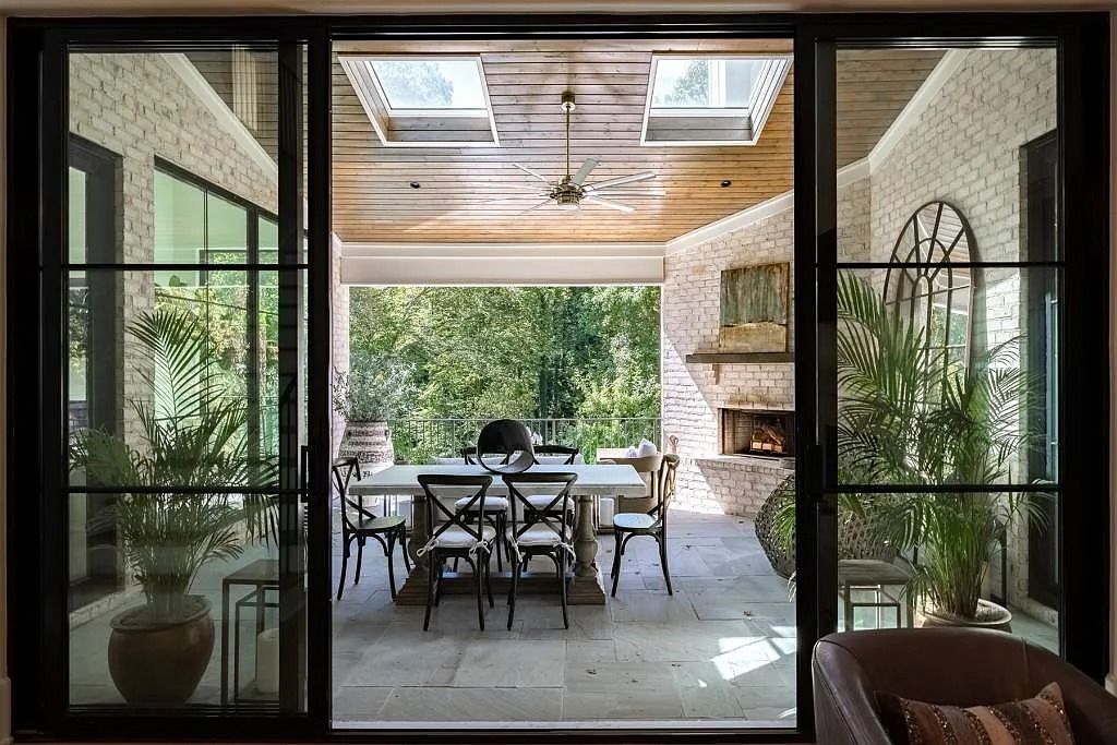 The Property in Atlanta boasts both a main & upper-level luxurious, primary suite, an elevator, hard to find 5 car, now available for sale. This home located at 4220 Harris Trl NW, Atlanta, Georgia