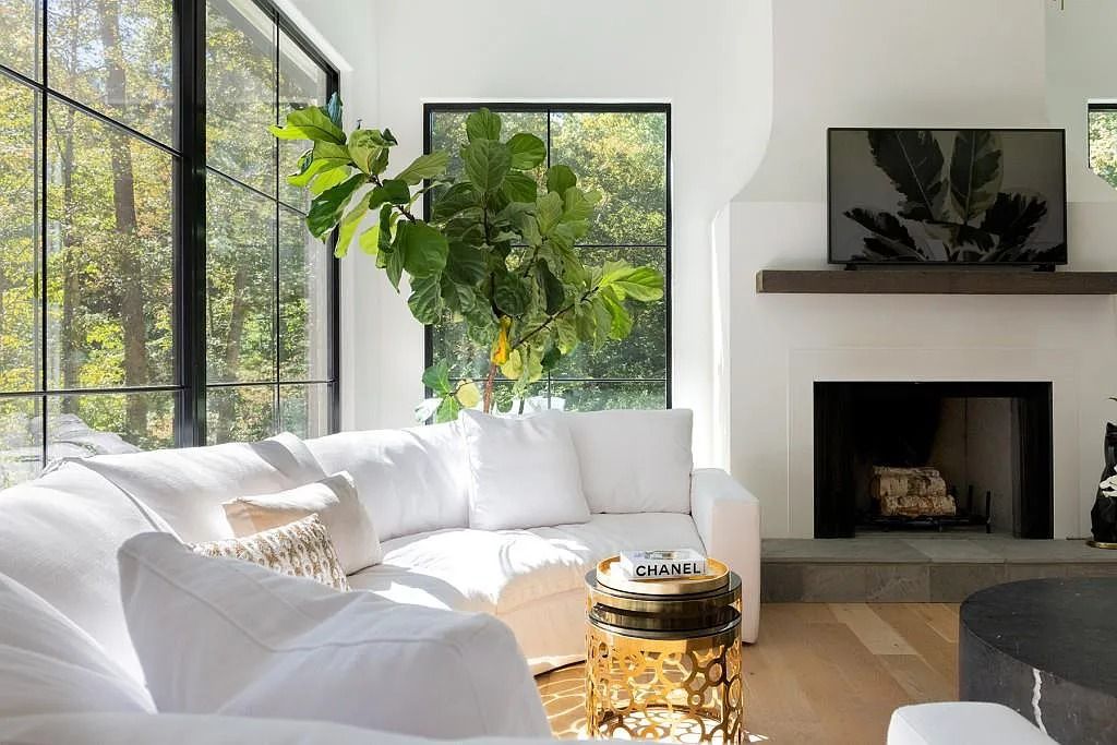 The Property in Atlanta boasts both a main & upper-level luxurious, primary suite, an elevator, hard to find 5 car, now available for sale. This home located at 4220 Harris Trl NW, Atlanta, Georgia