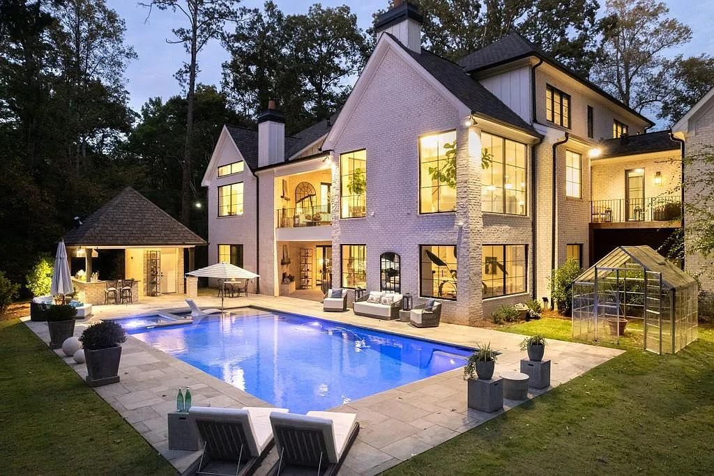 The Property in Atlanta boasts both a main & upper-level luxurious, primary suite, an elevator, hard to find 5 car, now available for sale. This home located at 4220 Harris Trl NW, Atlanta, Georgia