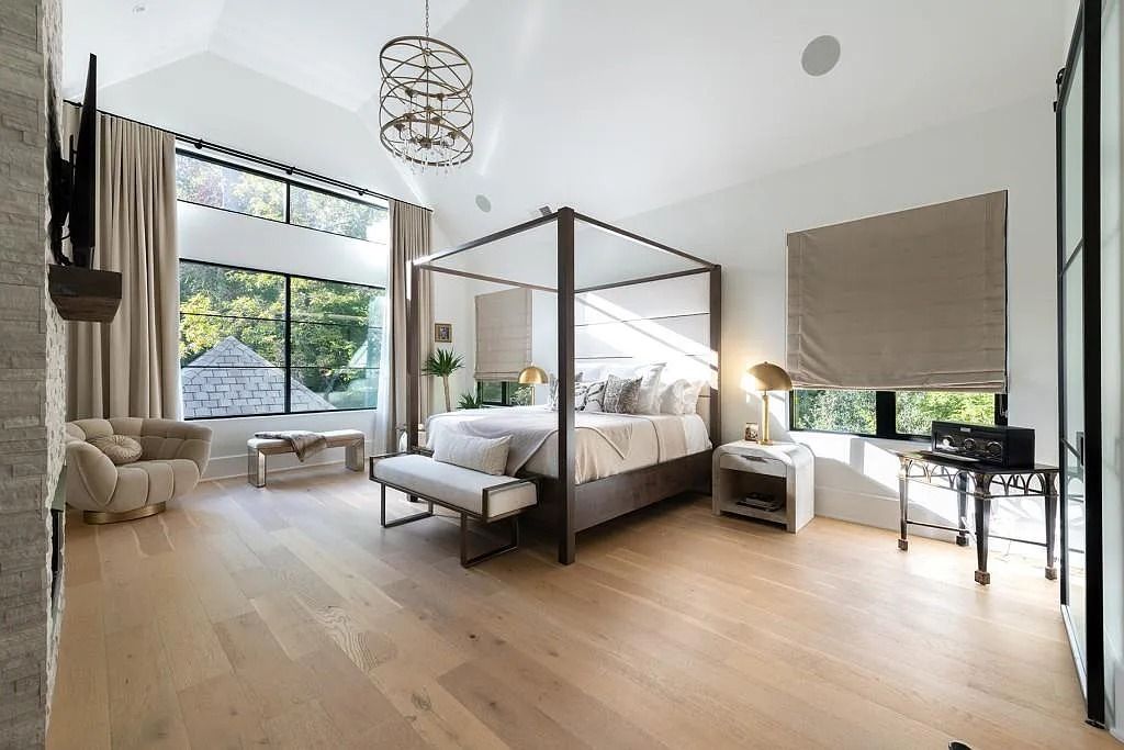 The Property in Atlanta boasts both a main & upper-level luxurious, primary suite, an elevator, hard to find 5 car, now available for sale. This home located at 4220 Harris Trl NW, Atlanta, Georgia