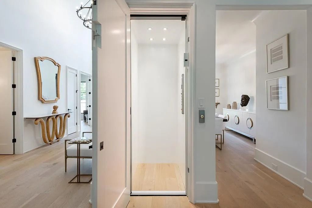The Property in Atlanta boasts both a main & upper-level luxurious, primary suite, an elevator, hard to find 5 car, now available for sale. This home located at 4220 Harris Trl NW, Atlanta, Georgia