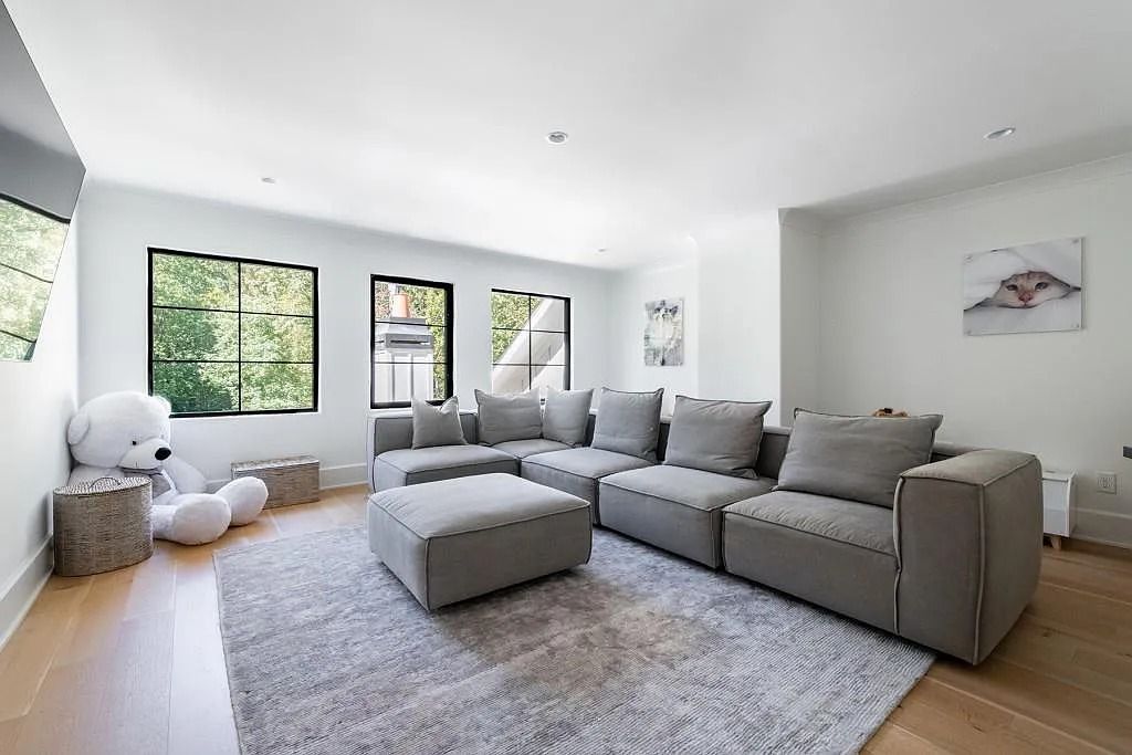 The Property in Atlanta boasts both a main & upper-level luxurious, primary suite, an elevator, hard to find 5 car, now available for sale. This home located at 4220 Harris Trl NW, Atlanta, Georgia