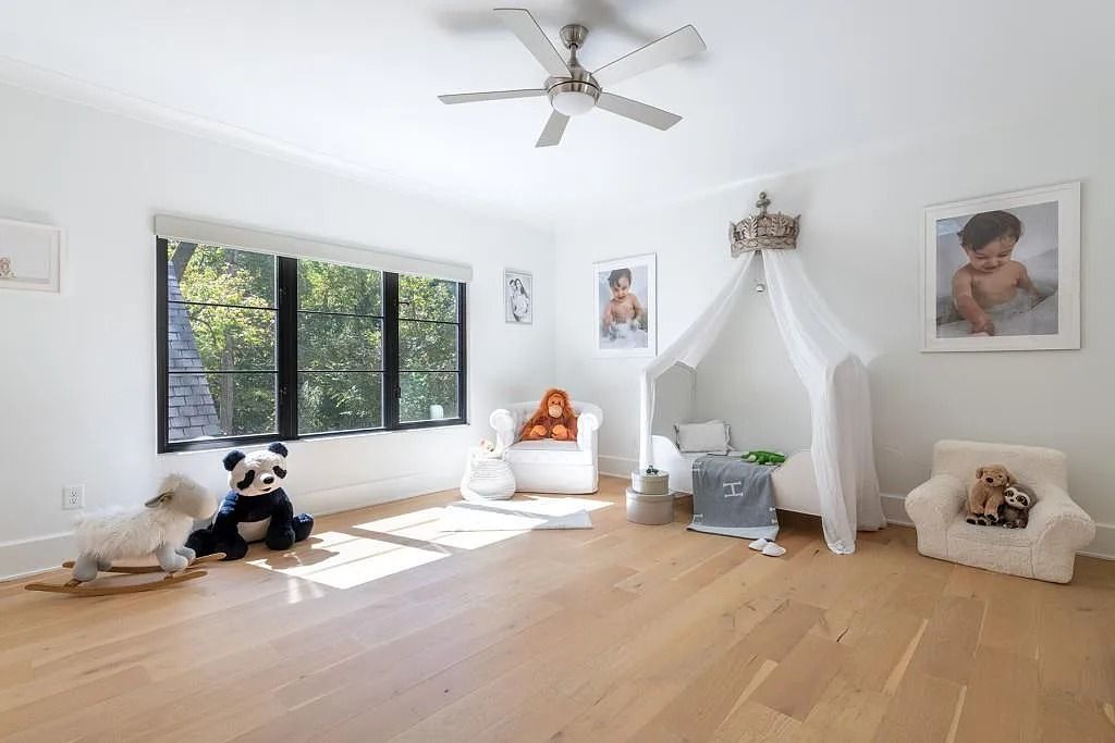 The Property in Atlanta boasts both a main & upper-level luxurious, primary suite, an elevator, hard to find 5 car, now available for sale. This home located at 4220 Harris Trl NW, Atlanta, Georgia