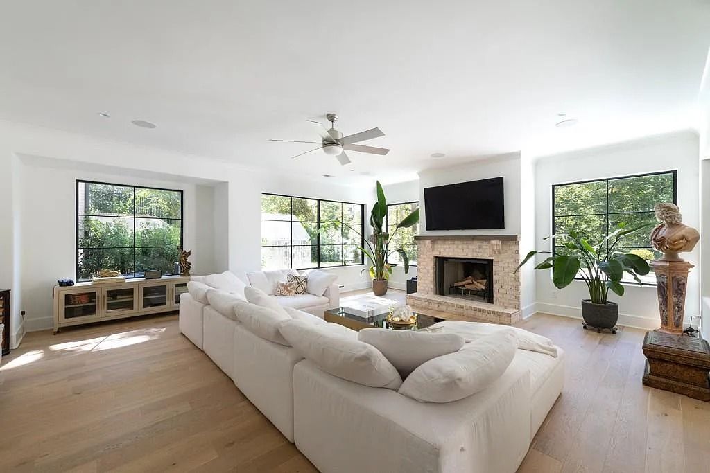 The Property in Atlanta boasts both a main & upper-level luxurious, primary suite, an elevator, hard to find 5 car, now available for sale. This home located at 4220 Harris Trl NW, Atlanta, Georgia