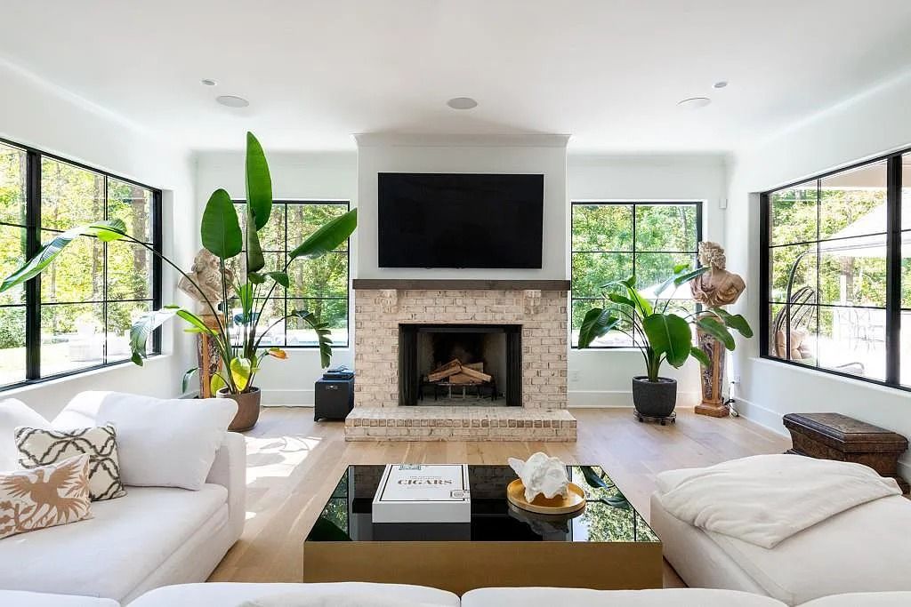 The Property in Atlanta boasts both a main & upper-level luxurious, primary suite, an elevator, hard to find 5 car, now available for sale. This home located at 4220 Harris Trl NW, Atlanta, Georgia