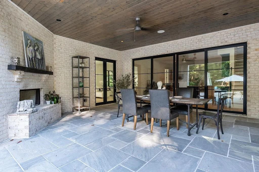The Property in Atlanta boasts both a main & upper-level luxurious, primary suite, an elevator, hard to find 5 car, now available for sale. This home located at 4220 Harris Trl NW, Atlanta, Georgia