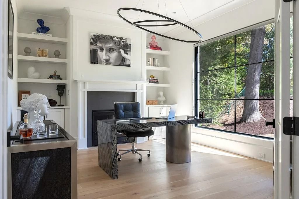 The Property in Atlanta boasts both a main & upper-level luxurious, primary suite, an elevator, hard to find 5 car, now available for sale. This home located at 4220 Harris Trl NW, Atlanta, Georgia