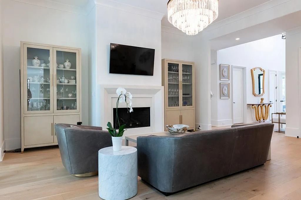 The Property in Atlanta boasts both a main & upper-level luxurious, primary suite, an elevator, hard to find 5 car, now available for sale. This home located at 4220 Harris Trl NW, Atlanta, Georgia
