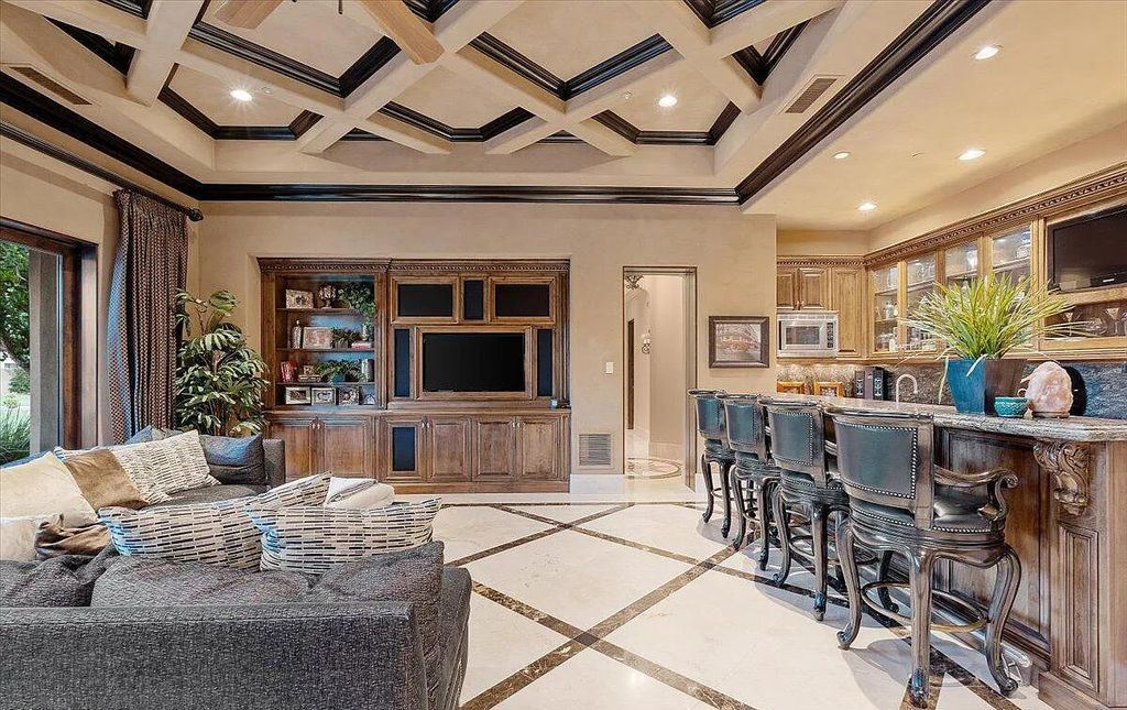 The Estate in Peoria, an absolutely beautiful home on 2.5 acres encompassing a world class resort style pool, water features, hot tub and cabana including fireplace is now available for sale. This home located at 7979 W Expedition Way, Peoria, Arizona