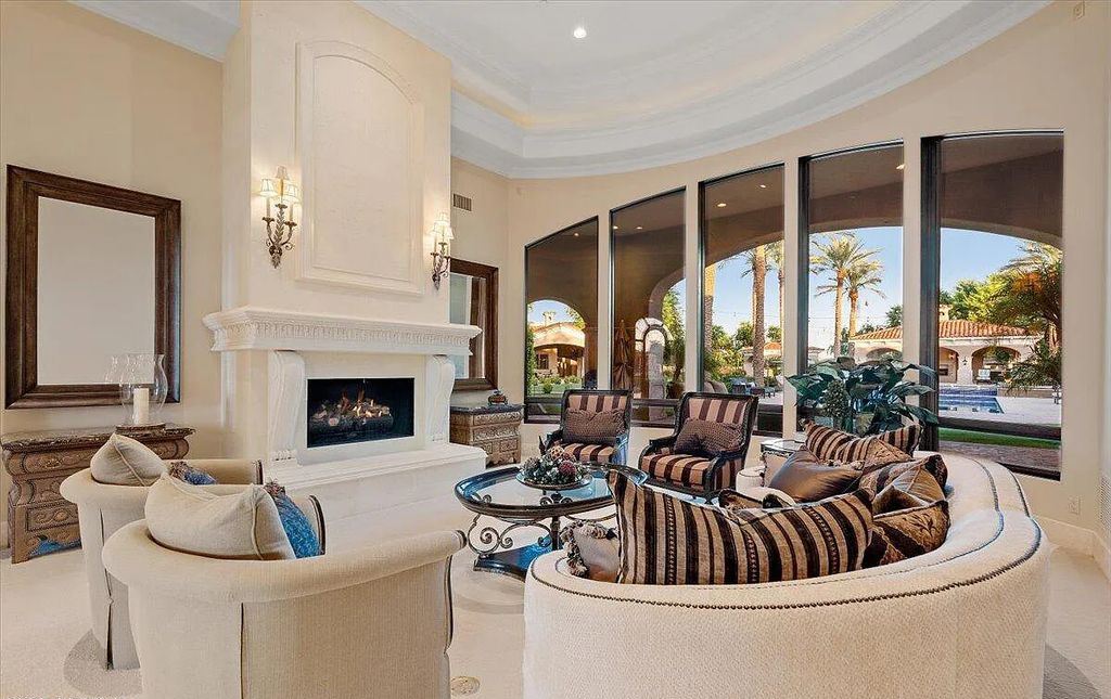 The Estate in Peoria, an absolutely beautiful home on 2.5 acres encompassing a world class resort style pool, water features, hot tub and cabana including fireplace is now available for sale. This home located at 7979 W Expedition Way, Peoria, Arizona