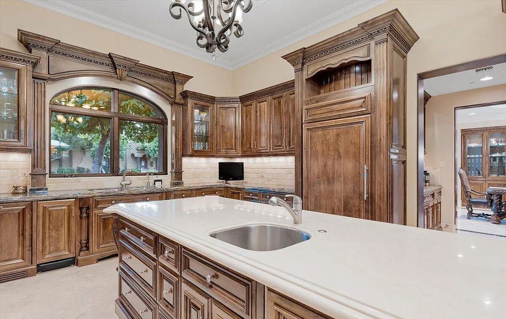 The Estate in Peoria, an absolutely beautiful home on 2.5 acres encompassing a world class resort style pool, water features, hot tub and cabana including fireplace is now available for sale. This home located at 7979 W Expedition Way, Peoria, Arizona