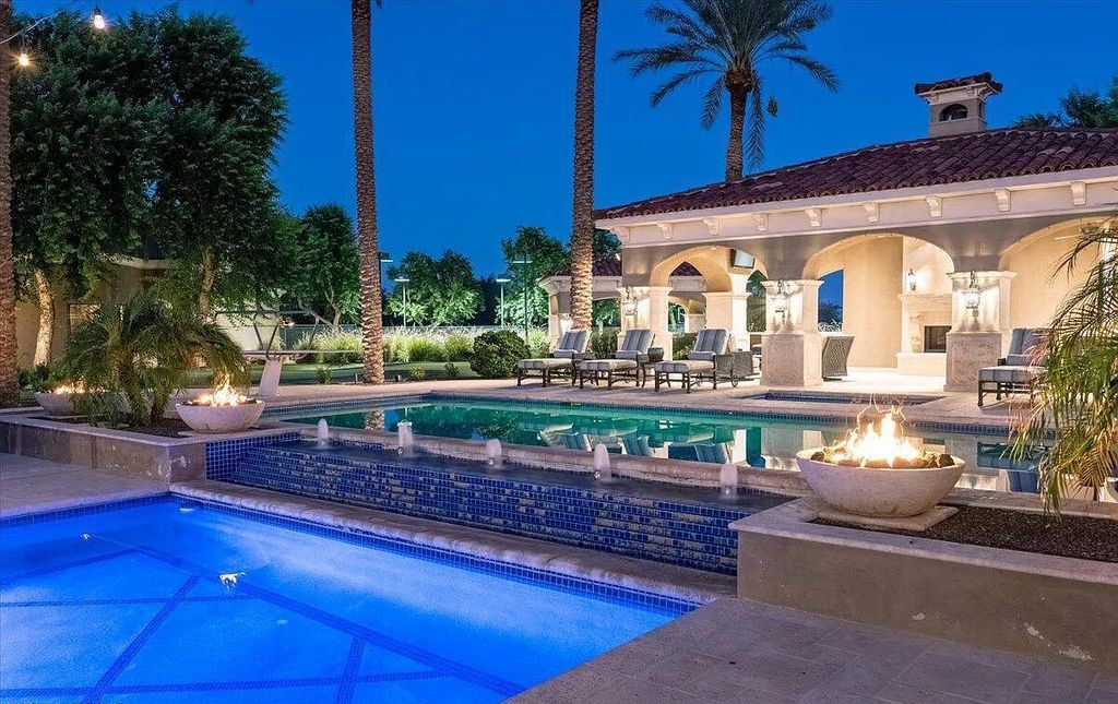 The Estate in Peoria, an absolutely beautiful home on 2.5 acres encompassing a world class resort style pool, water features, hot tub and cabana including fireplace is now available for sale. This home located at 7979 W Expedition Way, Peoria, Arizona