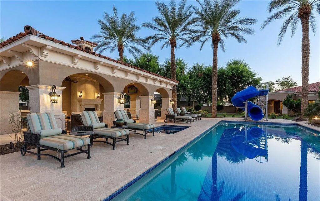 The Estate in Peoria, an absolutely beautiful home on 2.5 acres encompassing a world class resort style pool, water features, hot tub and cabana including fireplace is now available for sale. This home located at 7979 W Expedition Way, Peoria, Arizona