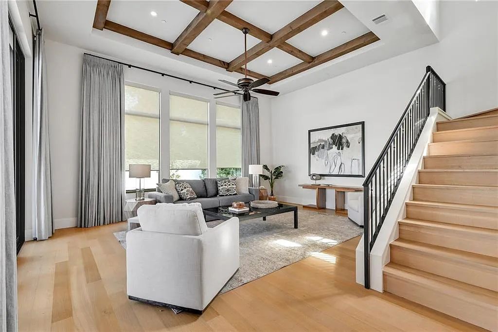 The Home in Austin, an immaculate modern estate nestled in the peaceful and tree-filled neighborhood of Rollingwood features resort-style backyard with a pool and spa, a covered outdoor kitchen is now available for sale. This home located at 4713 Timberline Dr, Austin, Texas