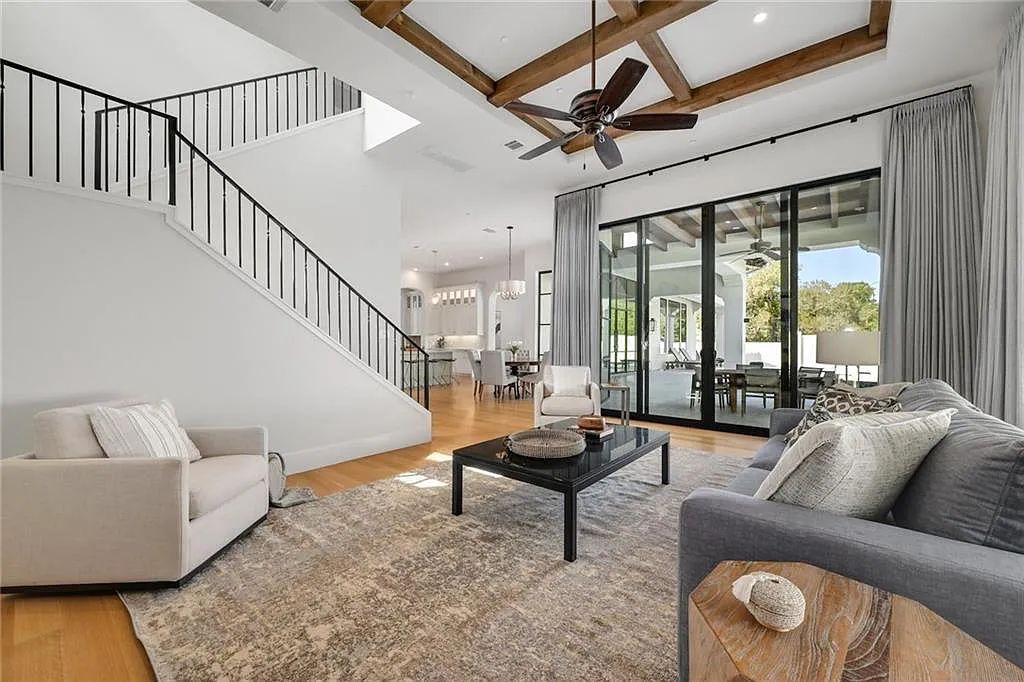 The Home in Austin, an immaculate modern estate nestled in the peaceful and tree-filled neighborhood of Rollingwood features resort-style backyard with a pool and spa, a covered outdoor kitchen is now available for sale. This home located at 4713 Timberline Dr, Austin, Texas