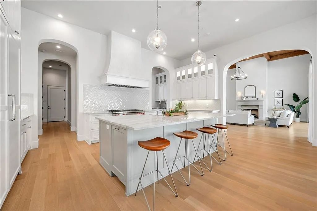 The Home in Austin, an immaculate modern estate nestled in the peaceful and tree-filled neighborhood of Rollingwood features resort-style backyard with a pool and spa, a covered outdoor kitchen is now available for sale. This home located at 4713 Timberline Dr, Austin, Texas