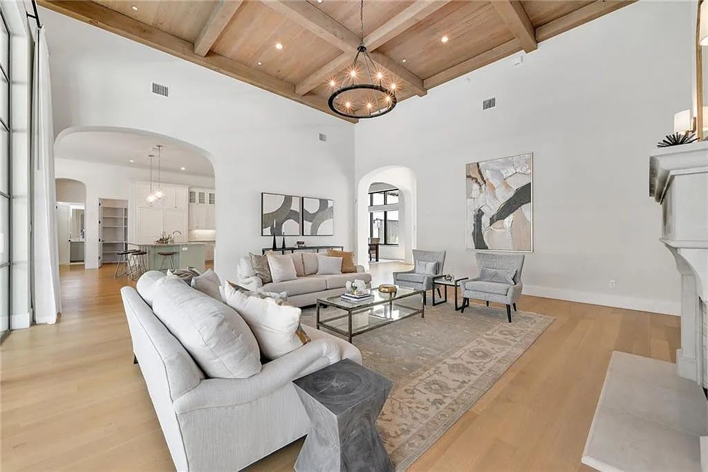 The Home in Austin, an immaculate modern estate nestled in the peaceful and tree-filled neighborhood of Rollingwood features resort-style backyard with a pool and spa, a covered outdoor kitchen is now available for sale. This home located at 4713 Timberline Dr, Austin, Texas