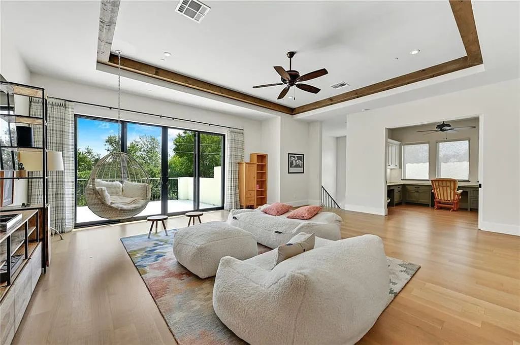 The Home in Austin, an immaculate modern estate nestled in the peaceful and tree-filled neighborhood of Rollingwood features resort-style backyard with a pool and spa, a covered outdoor kitchen is now available for sale. This home located at 4713 Timberline Dr, Austin, Texas