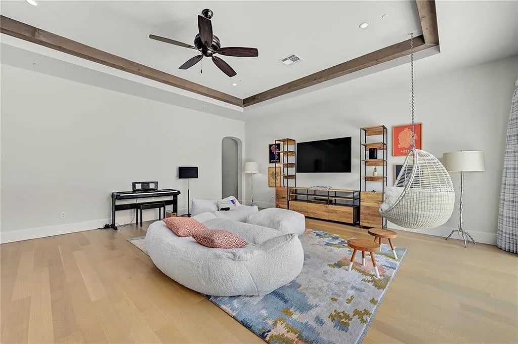 The Home in Austin, an immaculate modern estate nestled in the peaceful and tree-filled neighborhood of Rollingwood features resort-style backyard with a pool and spa, a covered outdoor kitchen is now available for sale. This home located at 4713 Timberline Dr, Austin, Texas