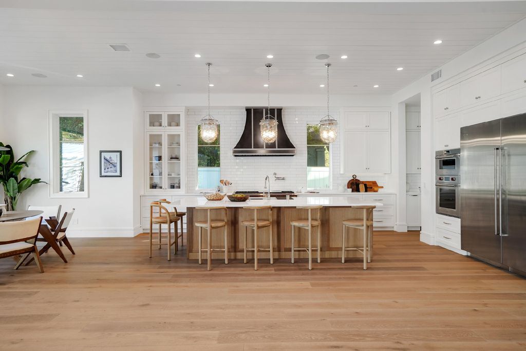 430 S Bundy Drive, Los Angeles, California is a masterpiece of both design and function on a rare half-acre lot blending sophisticated East Coast style and modern California flair.