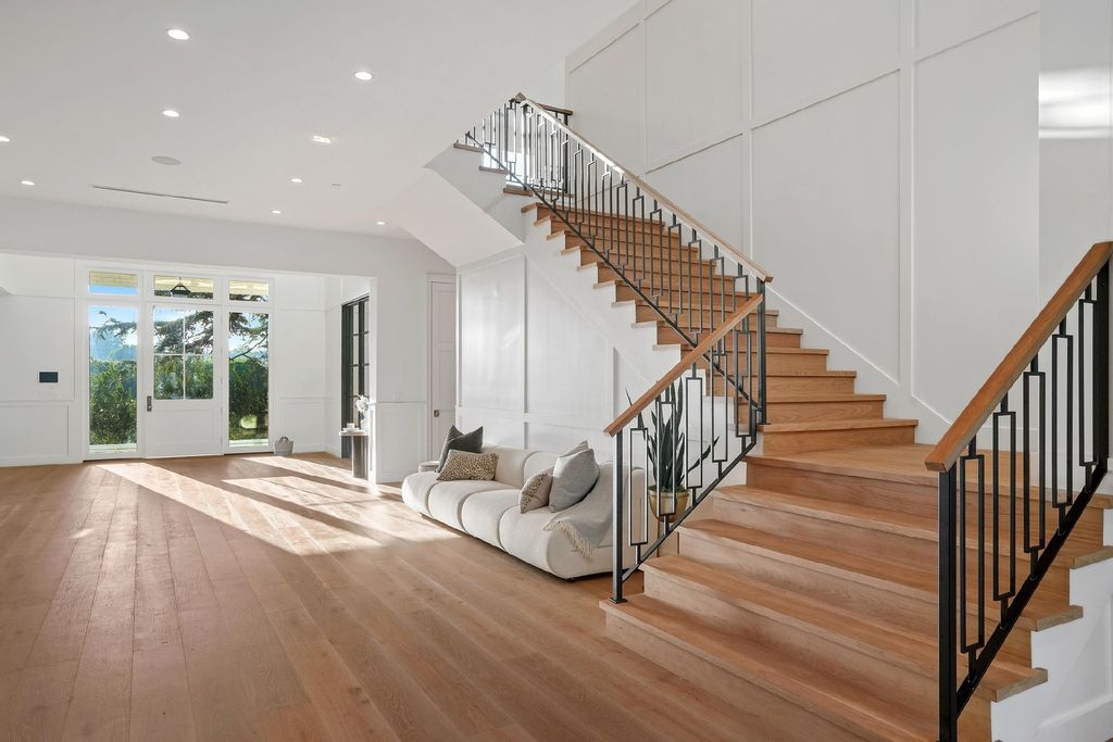 430 S Bundy Drive, Los Angeles, California is a masterpiece of both design and function on a rare half-acre lot blending sophisticated East Coast style and modern California flair.