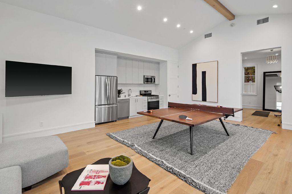 430 S Bundy Drive, Los Angeles, California is a masterpiece of both design and function on a rare half-acre lot blending sophisticated East Coast style and modern California flair.