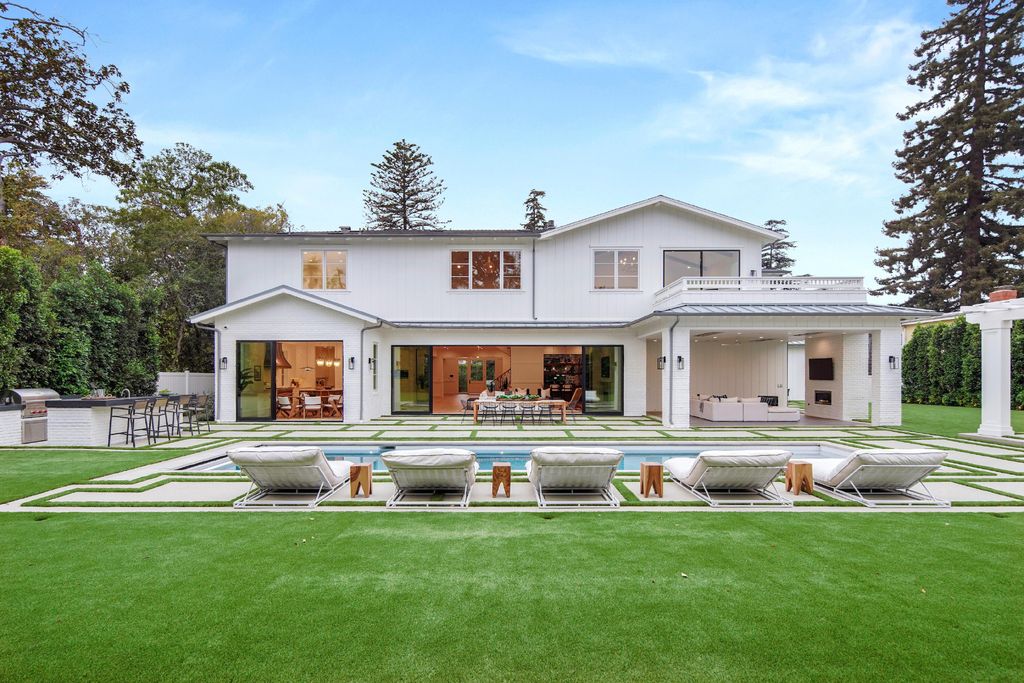 430 S Bundy Drive, Los Angeles, California is a masterpiece of both design and function on a rare half-acre lot blending sophisticated East Coast style and modern California flair.
