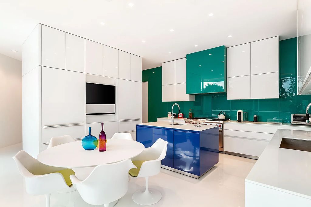34 Cobb Isle Road, Water Mill, New York is a contemporary architectural masterpiece by renowned architect Roger Ferris overlooking Mecox Bay and the Atlantic Ocean, with 2 docks, plus a fully restored guest house on its own single and separate lot.