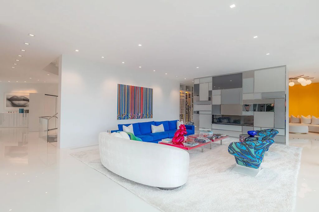 34 Cobb Isle Road, Water Mill, New York is a contemporary architectural masterpiece by renowned architect Roger Ferris overlooking Mecox Bay and the Atlantic Ocean, with 2 docks, plus a fully restored guest house on its own single and separate lot.