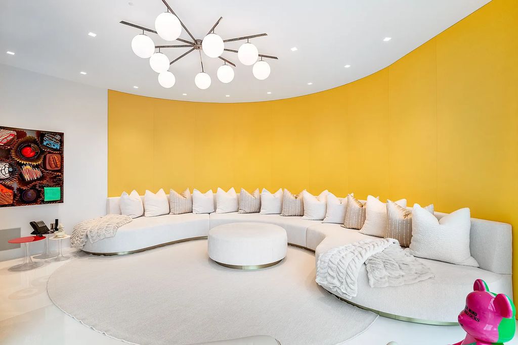 34 Cobb Isle Road, Water Mill, New York is a contemporary architectural masterpiece by renowned architect Roger Ferris overlooking Mecox Bay and the Atlantic Ocean, with 2 docks, plus a fully restored guest house on its own single and separate lot.