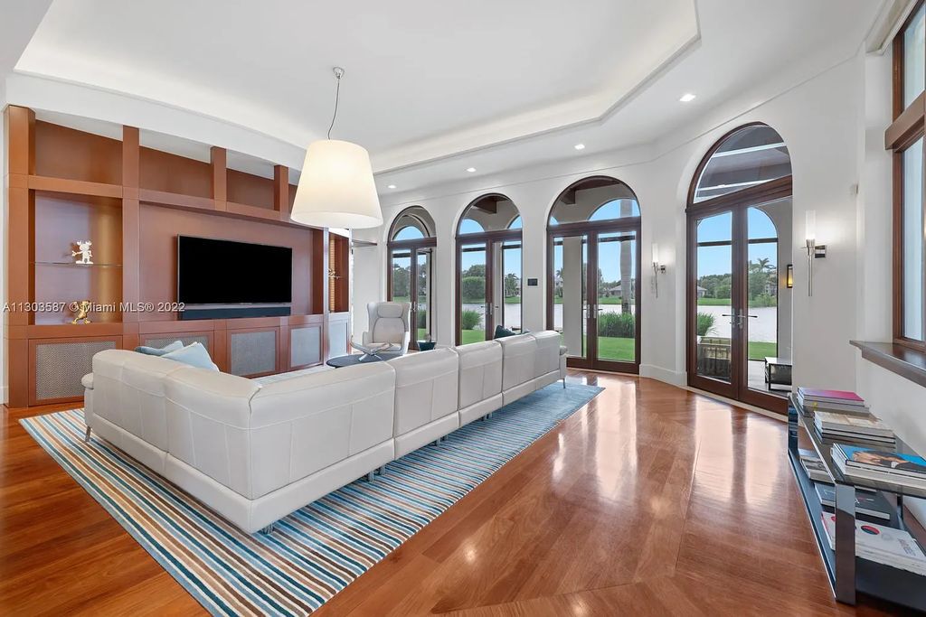 8808 Twin Lake Drive, Boca Raton, Florida is a classic Mediterranean waterfront estate with modern influences located in exclusive gated community of Long Lake Estates situated on 1.1 acres on the best cul-de-sac point lot with southern exposure and 300 ft of waterfrontage.