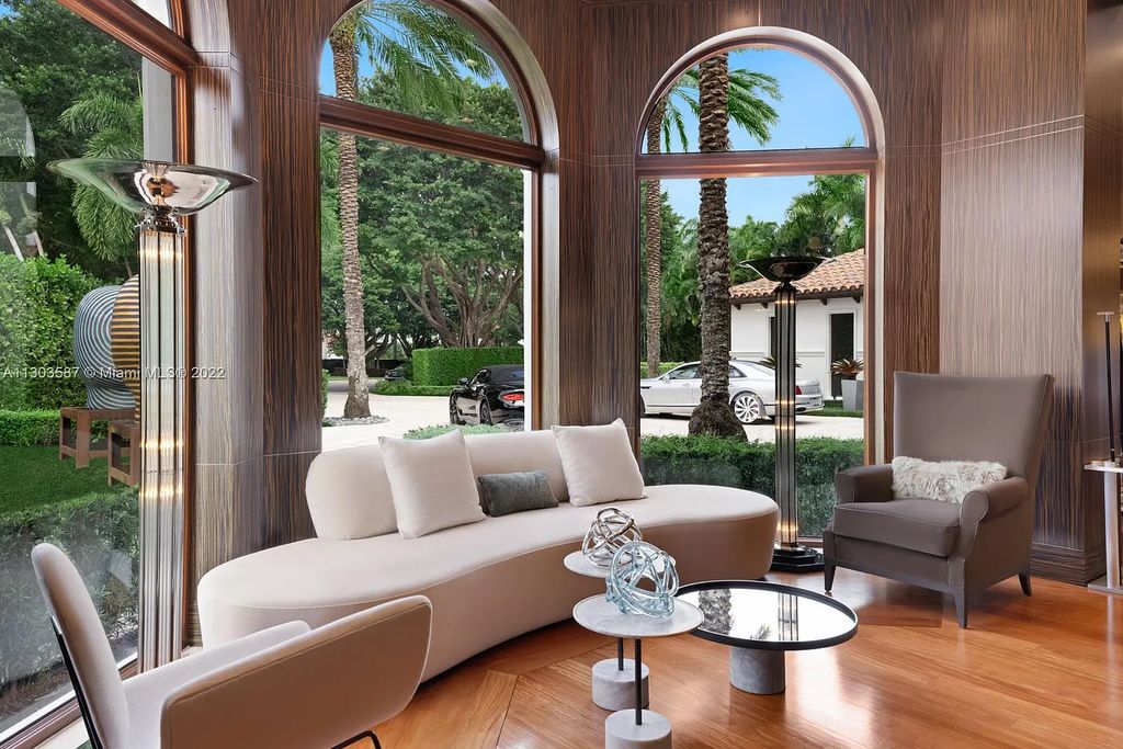 8808 Twin Lake Drive, Boca Raton, Florida is a classic Mediterranean waterfront estate with modern influences located in exclusive gated community of Long Lake Estates situated on 1.1 acres on the best cul-de-sac point lot with southern exposure and 300 ft of waterfrontage.
