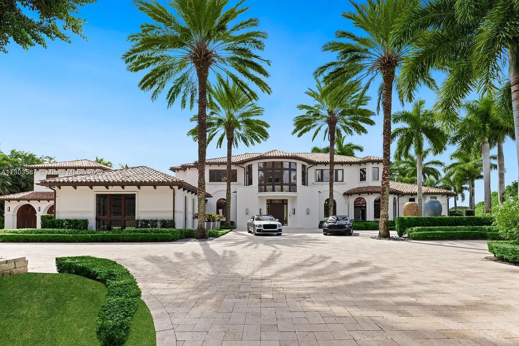 8808 Twin Lake Drive, Boca Raton, Florida is a classic Mediterranean waterfront estate with modern influences located in exclusive gated community of Long Lake Estates situated on 1.1 acres on the best cul-de-sac point lot with southern exposure and 300 ft of waterfrontage.