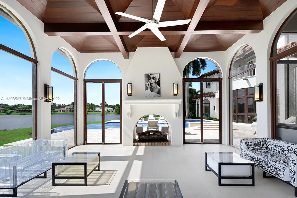 8808 Twin Lake Drive, Boca Raton, Florida is a classic Mediterranean waterfront estate with modern influences located in exclusive gated community of Long Lake Estates situated on 1.1 acres on the best cul-de-sac point lot with southern exposure and 300 ft of waterfrontage.