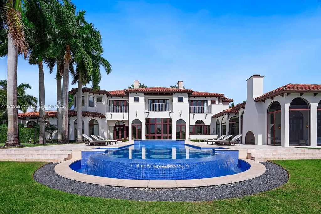 8808 Twin Lake Drive, Boca Raton, Florida is a classic Mediterranean waterfront estate with modern influences located in exclusive gated community of Long Lake Estates situated on 1.1 acres on the best cul-de-sac point lot with southern exposure and 300 ft of waterfrontage.