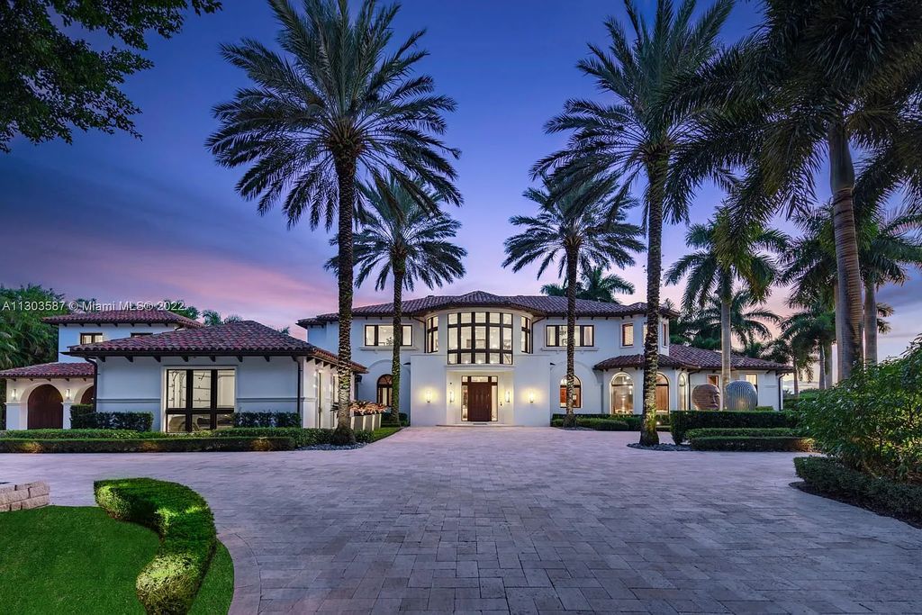 8808 Twin Lake Drive, Boca Raton, Florida is a classic Mediterranean waterfront estate with modern influences located in exclusive gated community of Long Lake Estates situated on 1.1 acres on the best cul-de-sac point lot with southern exposure and 300 ft of waterfrontage.