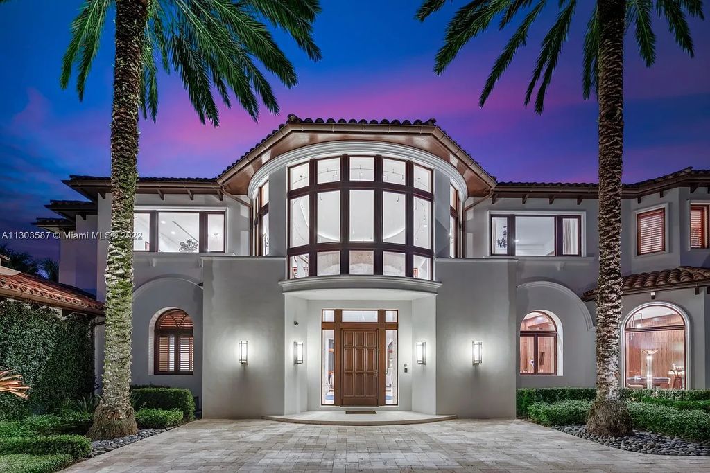 8808 Twin Lake Drive, Boca Raton, Florida is a classic Mediterranean waterfront estate with modern influences located in exclusive gated community of Long Lake Estates situated on 1.1 acres on the best cul-de-sac point lot with southern exposure and 300 ft of waterfrontage.