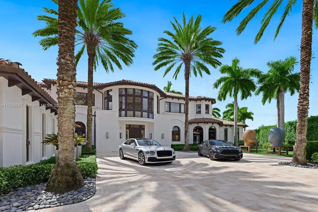 8808 Twin Lake Drive, Boca Raton, Florida is a classic Mediterranean waterfront estate with modern influences located in exclusive gated community of Long Lake Estates situated on 1.1 acres on the best cul-de-sac point lot with southern exposure and 300 ft of waterfrontage.