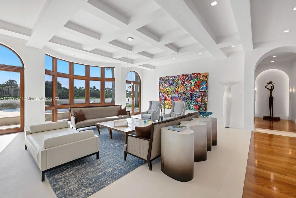 8808 Twin Lake Drive, Boca Raton, Florida is a classic Mediterranean waterfront estate with modern influences located in exclusive gated community of Long Lake Estates situated on 1.1 acres on the best cul-de-sac point lot with southern exposure and 300 ft of waterfrontage.
