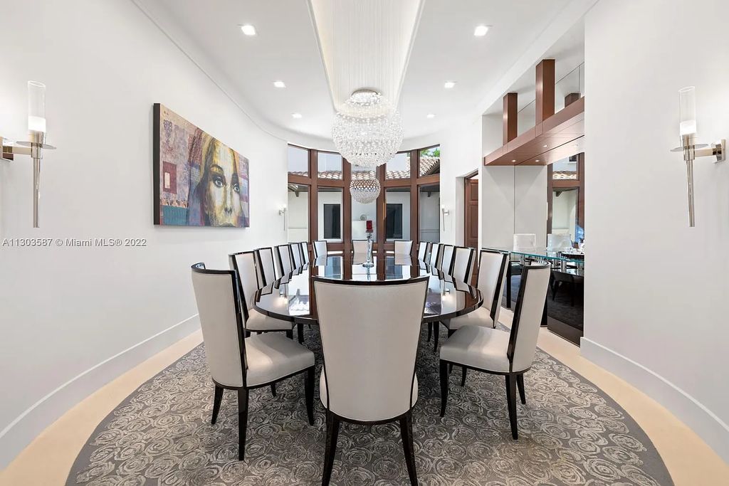 8808 Twin Lake Drive, Boca Raton, Florida is a classic Mediterranean waterfront estate with modern influences located in exclusive gated community of Long Lake Estates situated on 1.1 acres on the best cul-de-sac point lot with southern exposure and 300 ft of waterfrontage.