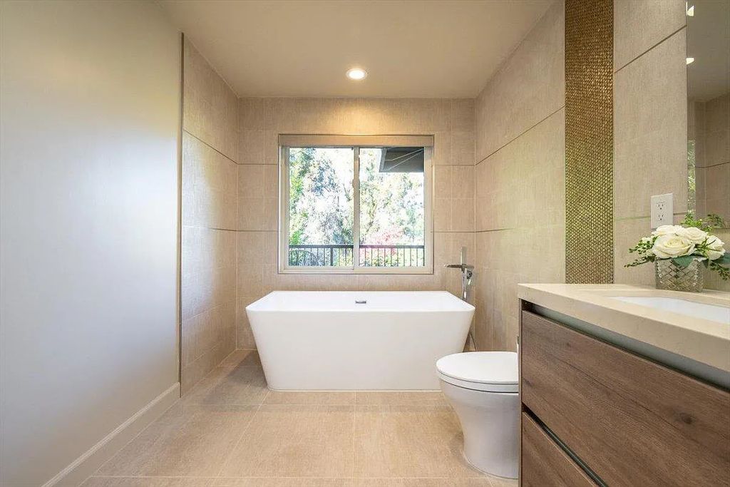 20901 Michaels Drive, Saratoga, California is a modern East facing home with divine sunrise views, city light night views sitting on a peaceful, quiet, location full of nature and still close to town; restaurants, parks, library, schools & more. 