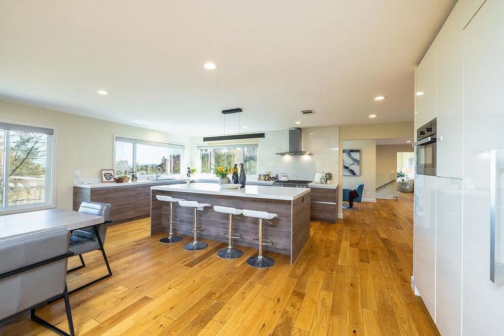 20901 Michaels Drive, Saratoga, California is a modern East facing home with divine sunrise views, city light night views sitting on a peaceful, quiet, location full of nature and still close to town; restaurants, parks, library, schools & more. 