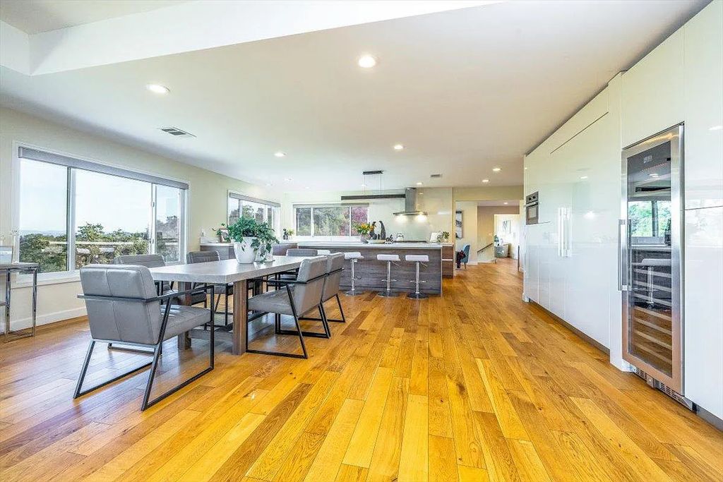 20901 Michaels Drive, Saratoga, California is a modern East facing home with divine sunrise views, city light night views sitting on a peaceful, quiet, location full of nature and still close to town; restaurants, parks, library, schools & more. 