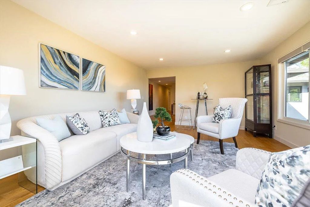 20901 Michaels Drive, Saratoga, California is a modern East facing home with divine sunrise views, city light night views sitting on a peaceful, quiet, location full of nature and still close to town; restaurants, parks, library, schools & more. 