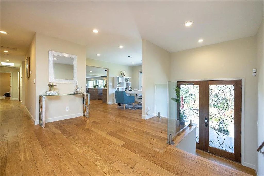 20901 Michaels Drive, Saratoga, California is a modern East facing home with divine sunrise views, city light night views sitting on a peaceful, quiet, location full of nature and still close to town; restaurants, parks, library, schools & more. 