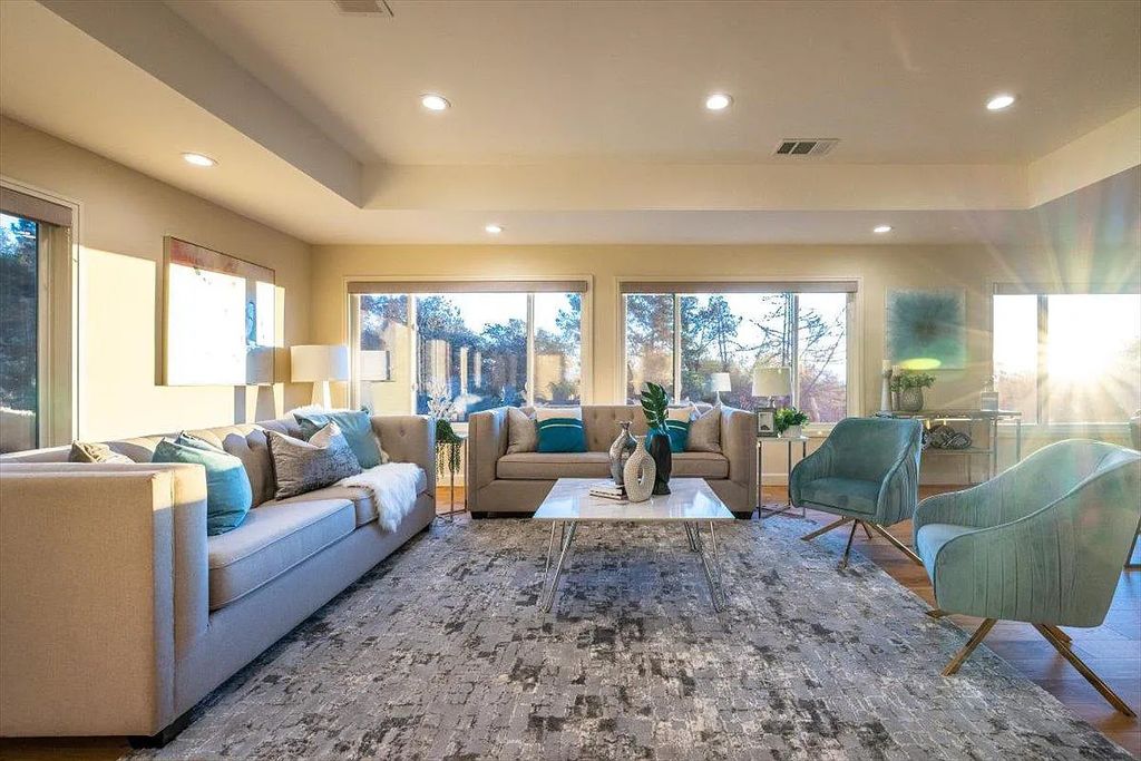 20901 Michaels Drive, Saratoga, California is a modern East facing home with divine sunrise views, city light night views sitting on a peaceful, quiet, location full of nature and still close to town; restaurants, parks, library, schools & more. 