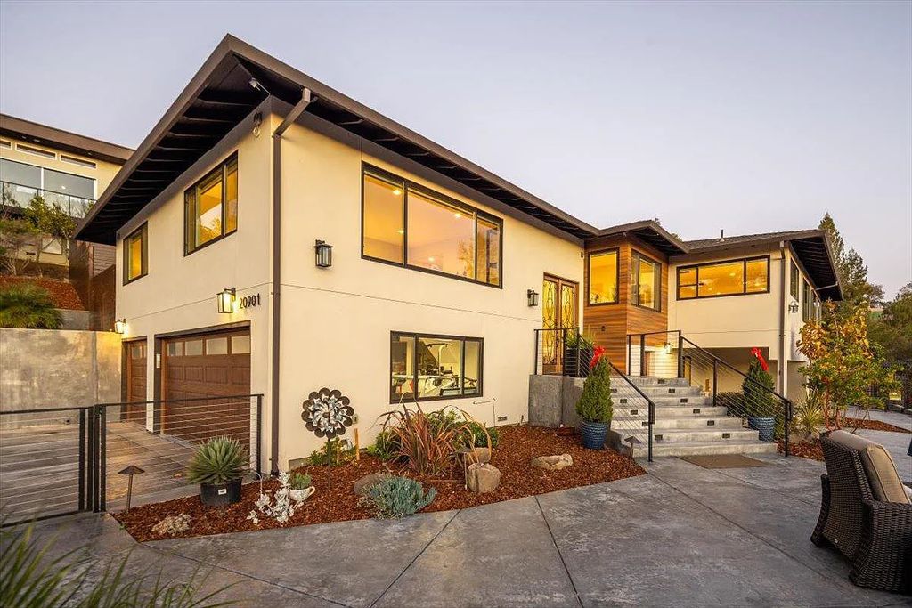 20901 Michaels Drive, Saratoga, California is a modern East facing home with divine sunrise views, city light night views sitting on a peaceful, quiet, location full of nature and still close to town; restaurants, parks, library, schools & more. 