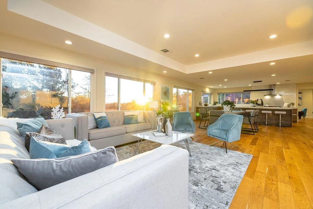 20901 Michaels Drive, Saratoga, California is a modern East facing home with divine sunrise views, city light night views sitting on a peaceful, quiet, location full of nature and still close to town; restaurants, parks, library, schools & more. 